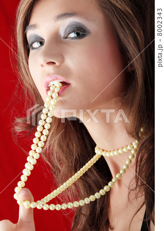 Sexy young woman with a pearls Sexy young woman with a pearls 8002343