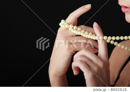 Woman with a pearl necklace Woman with a pearl necklace 8002610