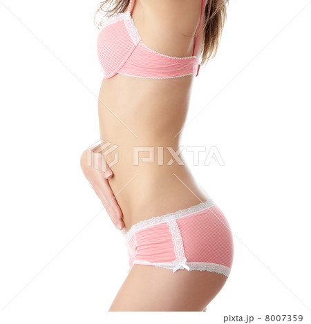Young woman with hand on her stomach Young woman with hand on her stomach 8007359