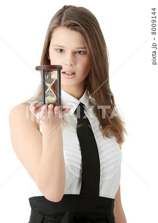 Young business woman with hourglass Young business woman with hourglass 8009144