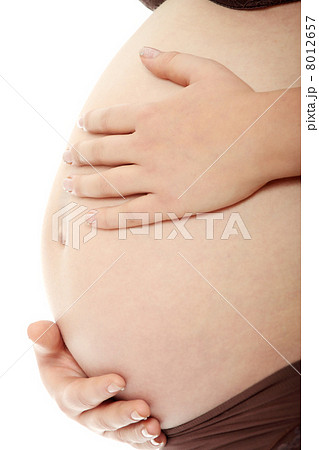 Belly of a pregnant woman Belly of a pregnant woman 8012657