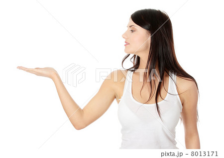 Woman presenting something on her hand 8013171