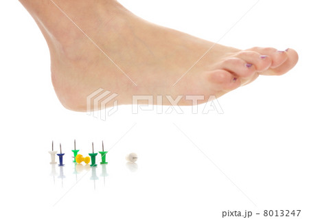 Female foot above pushpin 8013247