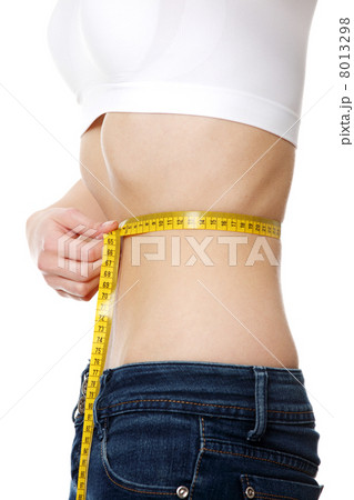Belly of beautiful young female with anorexia 8013298