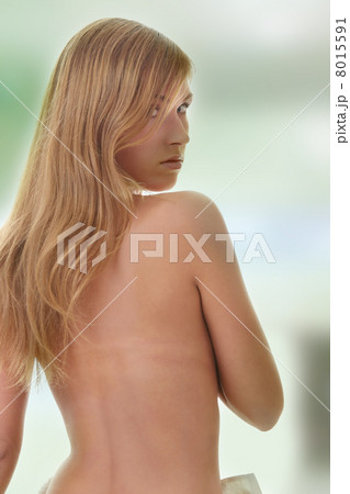Beautiful young naked woman isolated on white background Beautiful young naked woman isolated on white background 8015591