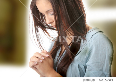 Young caucasian woman praying Young caucasian woman praying 8015784