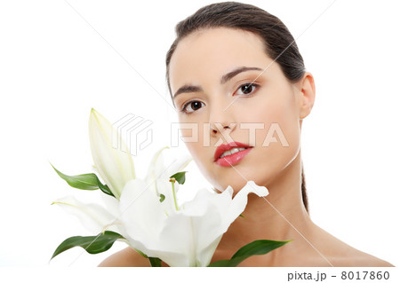 Spa woman with lily flower 8017860