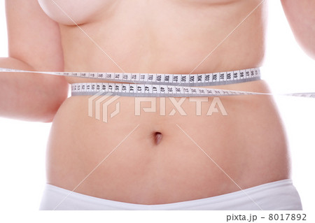 Female measuring her body Female measuring her body 8017892