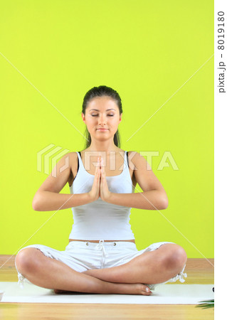 Young yoga female doing yogatic exericise Young yoga female doing yogatic exericise 8019180
