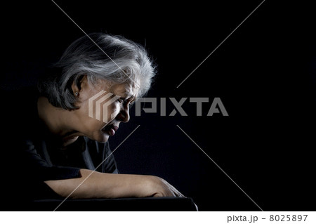 Old woman feeling depressed 8025897
