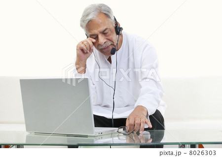 Old man wiping his eye Old man wiping his eye 8026303