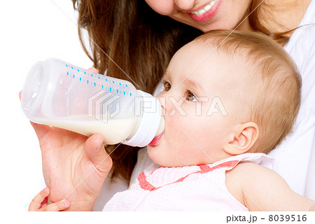 Feeding Baby. Baby eating milk from the bottle Feeding Baby. Baby eating milk from the bottle 8039516