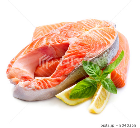 Raw Salmon Red Fish Steak with Herbs and Lemon isolated on White 8040358