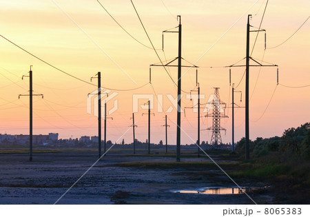 Sunset and high-voltage line Sunset and high-voltage line 8065383