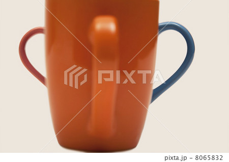 Close-up of an orange mug 8065832