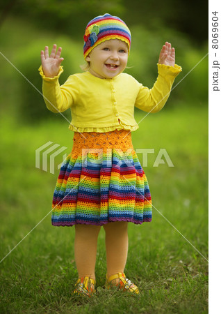 little girl greets hands up 8069604
