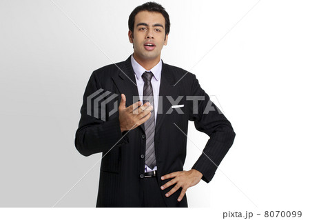 Businessman having a conversation Businessman having a conversation 8070099