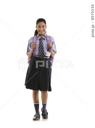 Portrait of a school girl smiling 8070330