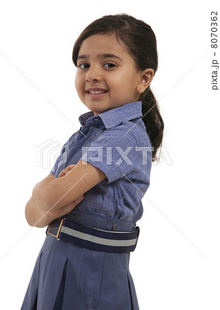 Portrait of a young school girl smiling Portrait of a young school girl smiling 8070362