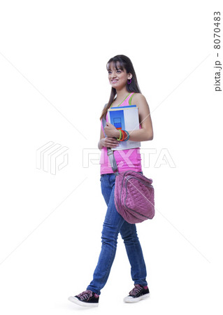 Full length of happy university student with books over white background Full length of happy university student with books over white background 8070483