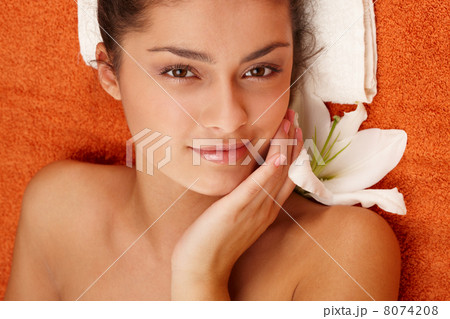 Girl with olive skin at spa 8074208