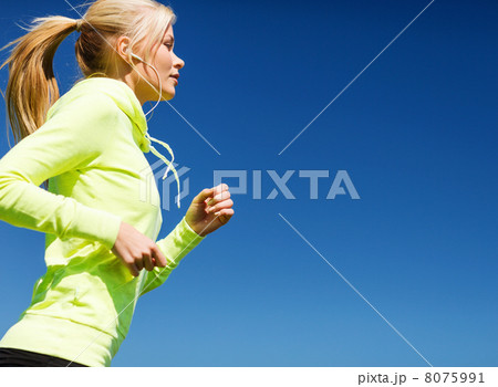 woman doing running outdoors 8075991