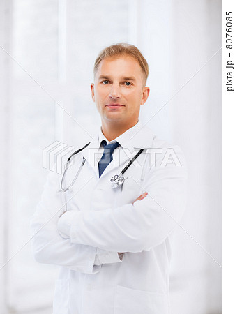 male doctor with stethoscope 8076085
