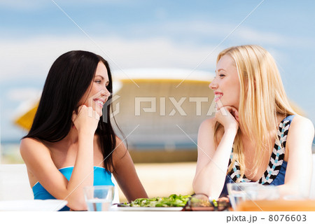 girls in cafe on the beach girls in cafe on the beach 8076603