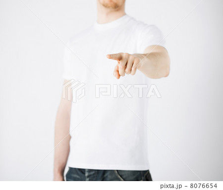 man pointing his finger at you man pointing his finger at you 8076654