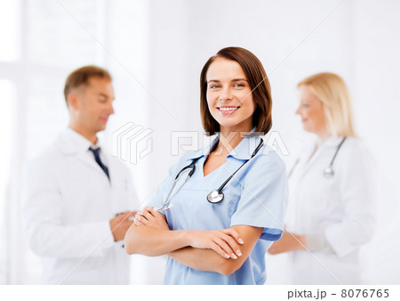 young female doctor with stethoscope young female doctor with stethoscope 8076765