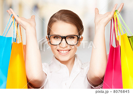 woman with shopping bags in ctiy woman with shopping bags in ctiy 8076845
