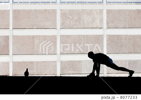 Female runner stretches in the morning. Female runner stretches in the morning. 8077233