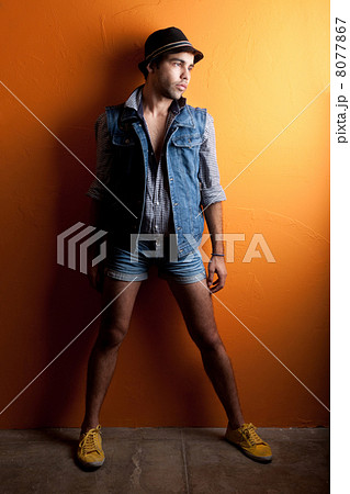 Sexy gay man in jeans and hat 8077867