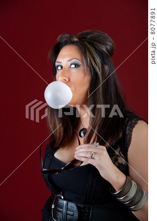 New Jersey housewife blowing a bubble New Jersey housewife blowing a bubble 8077891