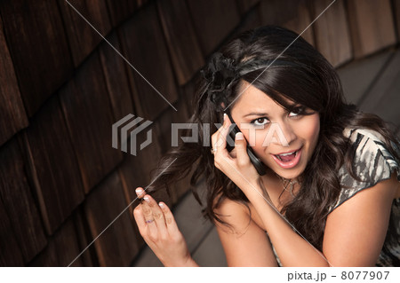 Beautiful Latina Woman on Cell Phone Beautiful Latina Woman on Cell Phone 8077907