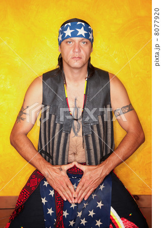 Kneeling Native American man 8077920