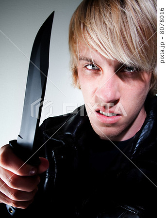 Young man with knife 8078016
