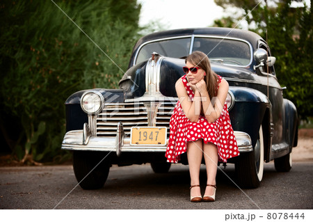 Girl in red with vintage car Girl in red with vintage car 8078444