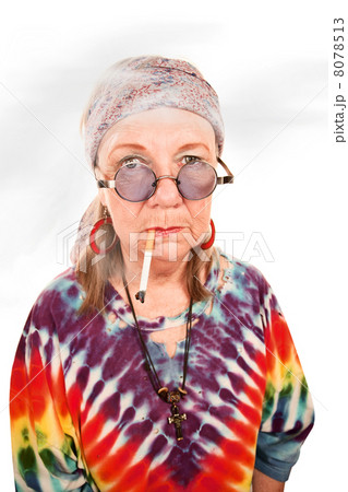Senior hippie lady smoking 8078513