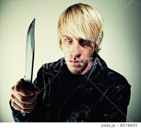 Young man with knife 8078605