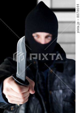 Young Criminal with Knife 8078644