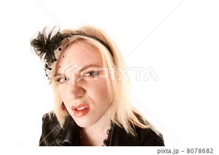 Pretty blonde woman with angry expression 8078682