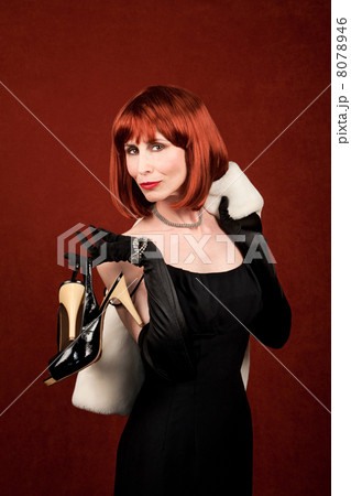 Socialite with brassy red hair Socialite with brassy red hair 8078946
