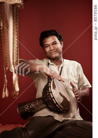 Indian Man Playing Tabla Indian Man Playing Tabla 8079586
