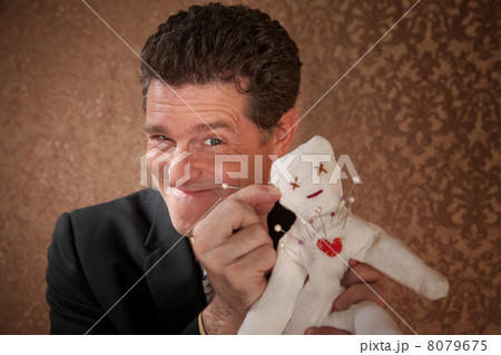 Man with a Voodoo doll 8079675
