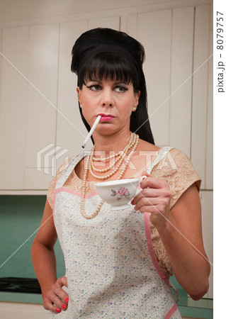 Woman with Cigarette and Coffee Cup Woman with Cigarette and Coffee Cup 8079757