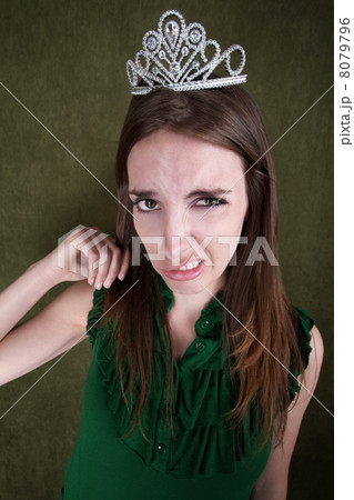 Disgusted Young Woman in Crown 8079796