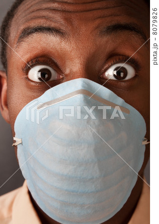 Frightened Man in Surgical Mask Frightened Man in Surgical Mask 8079826