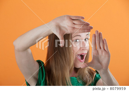 Suprised Woman Framing Her Face Suprised Woman Framing Her Face 8079959