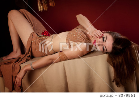 Beautiful Belly Dancer Lying Down Beautiful Belly Dancer Lying Down 8079961